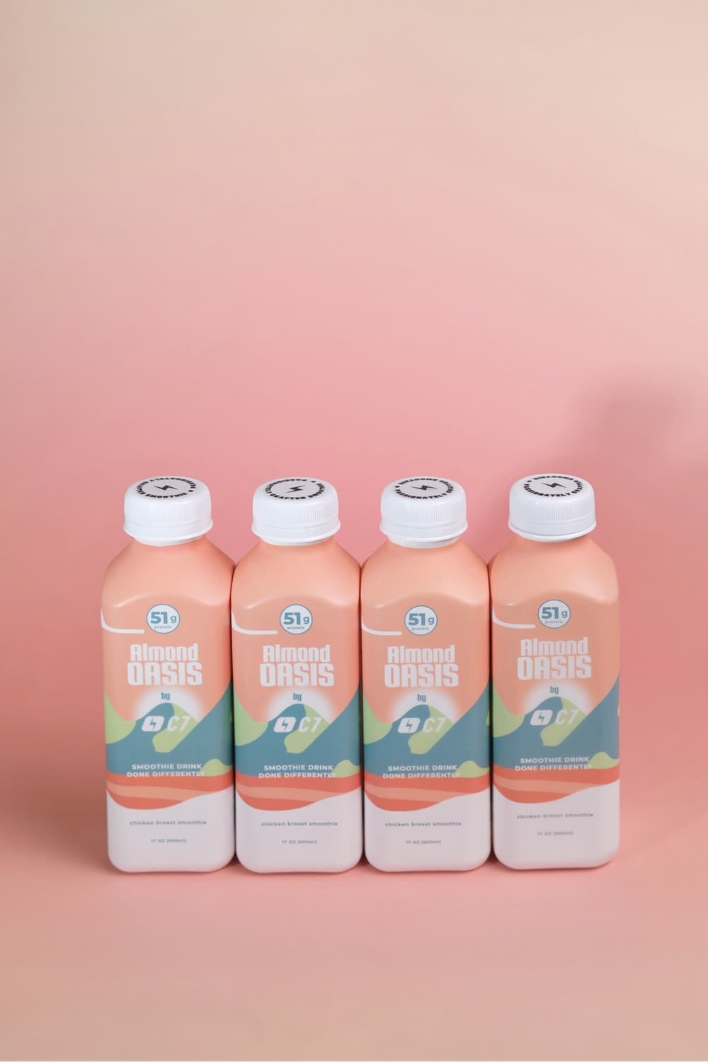 Four Almond Oasis bottles lined up