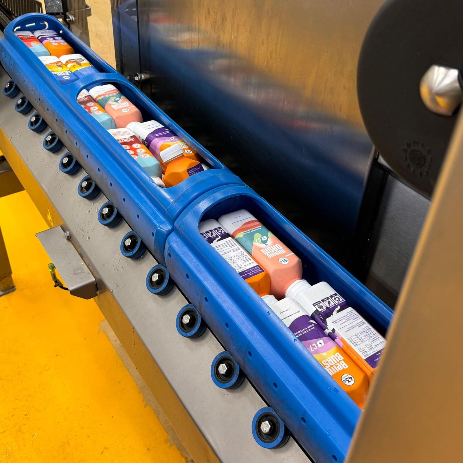 Sealed C7 bottles lying in a blue carrier
